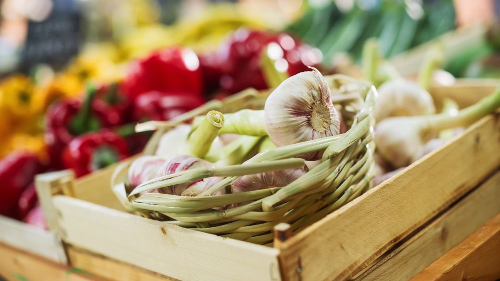 Naturally-Grown Garlic Sold on a Stall at a Farmers Market.