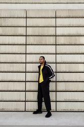 Black male near concrete blocks