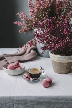 Cup of espresso with macaroons