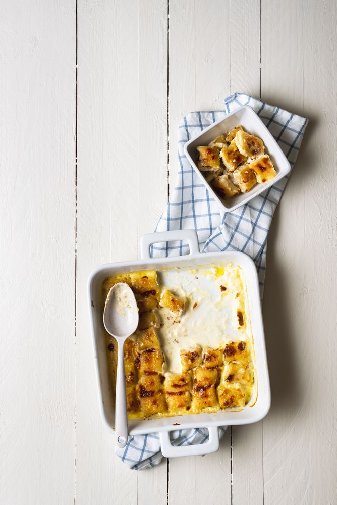 Serving portion of gratin cheese gnocchi