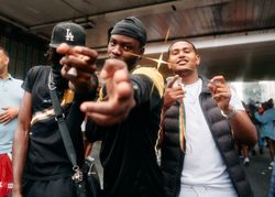 London, England, United Kingdom - August 28, 2022: Group of friends pointing to camera