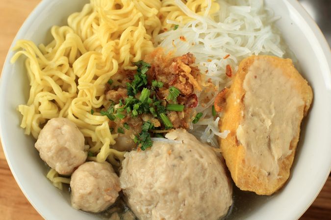 Bakso Kuah, Indonesian meatball Soup with Yellow Noodle, Vermicelli, and Tahu Baso