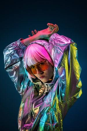 Woman standing in sparkly silver jacket
