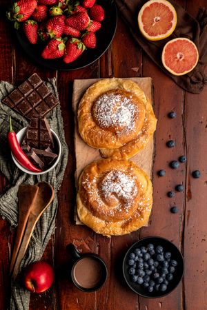 Breakfast food and drink on wooden table