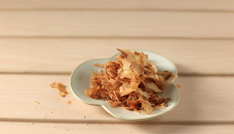 Dried bonito flakes on wooden table