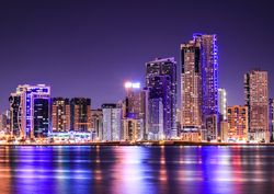 City skyline of Sharjah, UAE during night time 5oKgx5