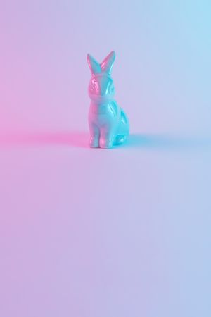 Plastic Easter bunny with colorful ultraviolet holographic neon lights