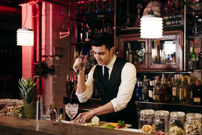 Barman working making drinks