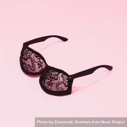 Half bra, half sunglasses on pink background 4doPn5