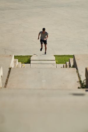 Fast man running on stones