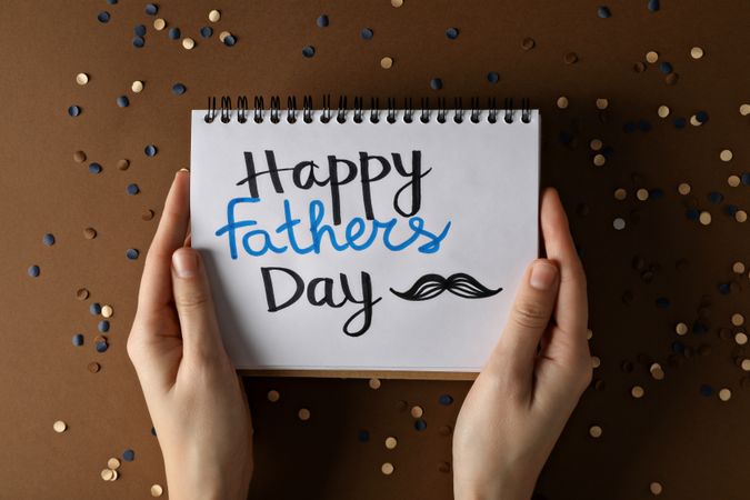 Father's day concept, gifts and greetings, on a brown background.