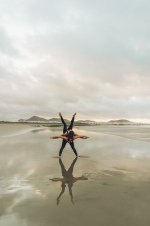 Women exercising near sea