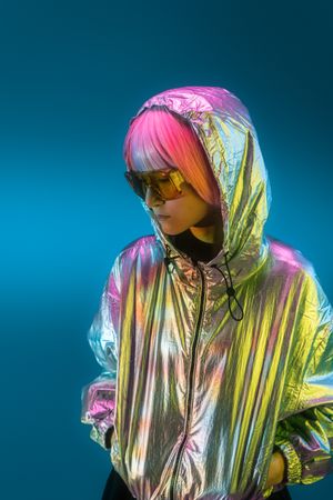 Woman standing in sparkly silver jacket