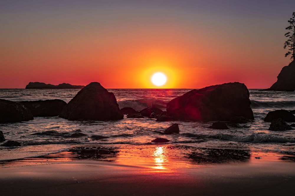 Waves coming into beach during beautiful sunset