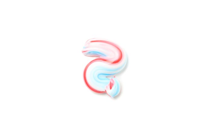 Toothpaste isolated on light background. Dental care