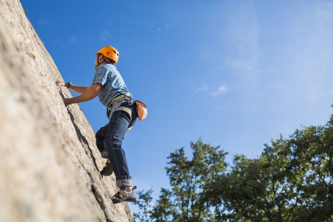 Free climber climbing in nature