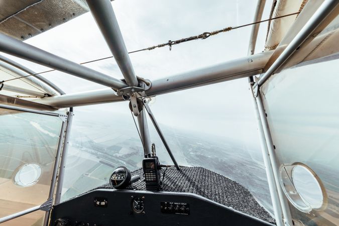 Aerial view from inside the cockpit of a small plane