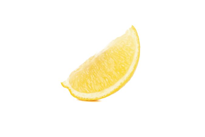 Lemon slice isolated on light background. Ripe fruit