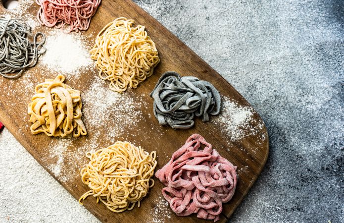 Top view of homemade pasta on cutting board