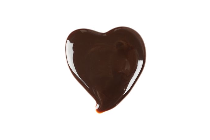 Tasty chocolate in the heart form isolated on blank background