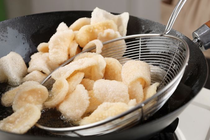 Deep Frying Crackers in the Hot Oil