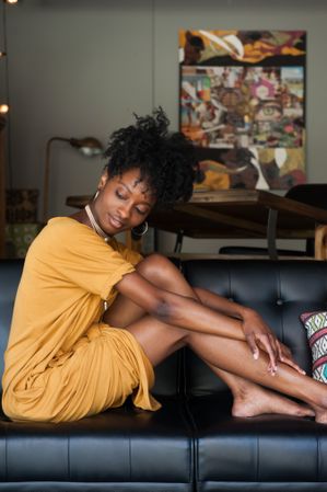 Woman sitting on couch