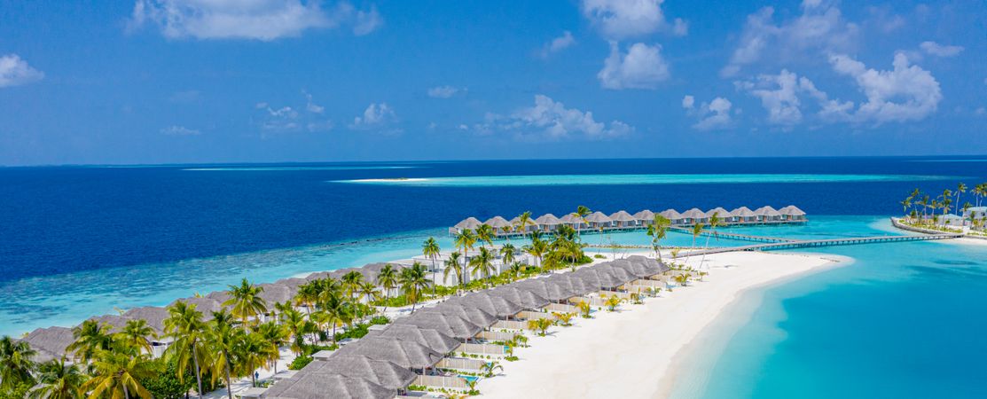 Wide shot of a beach resort on a tropical beach