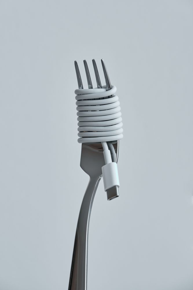 Fork with a cable wrapped like noodles