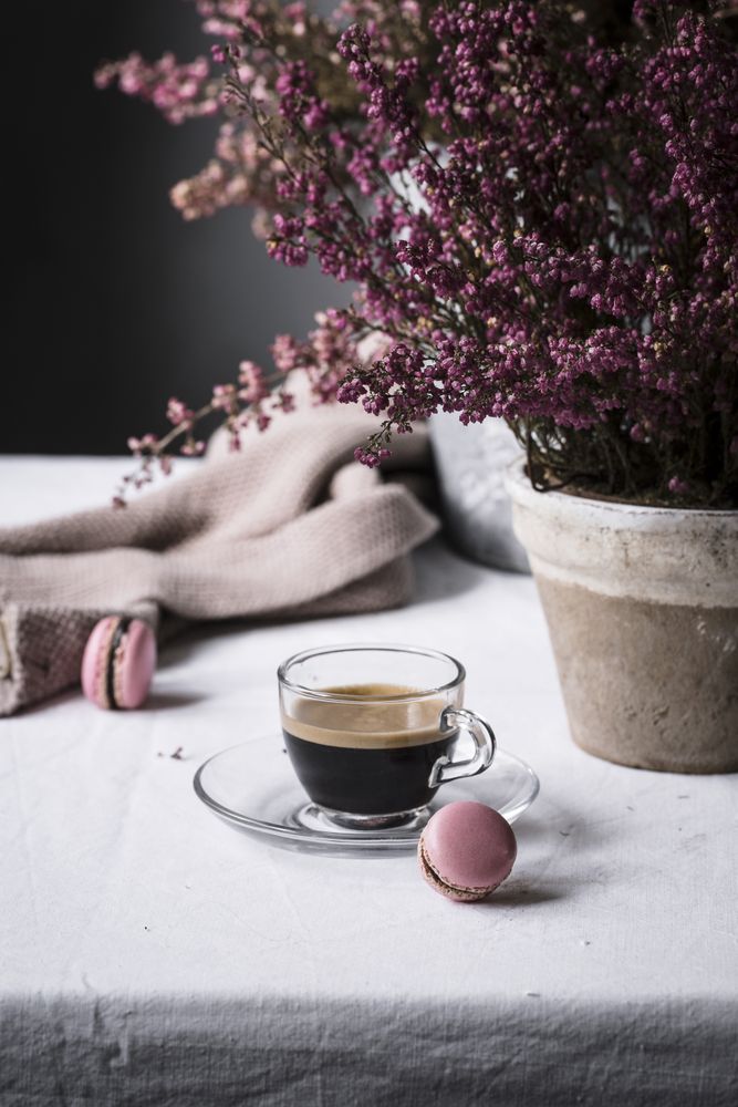 Cup of espresso with macaroons