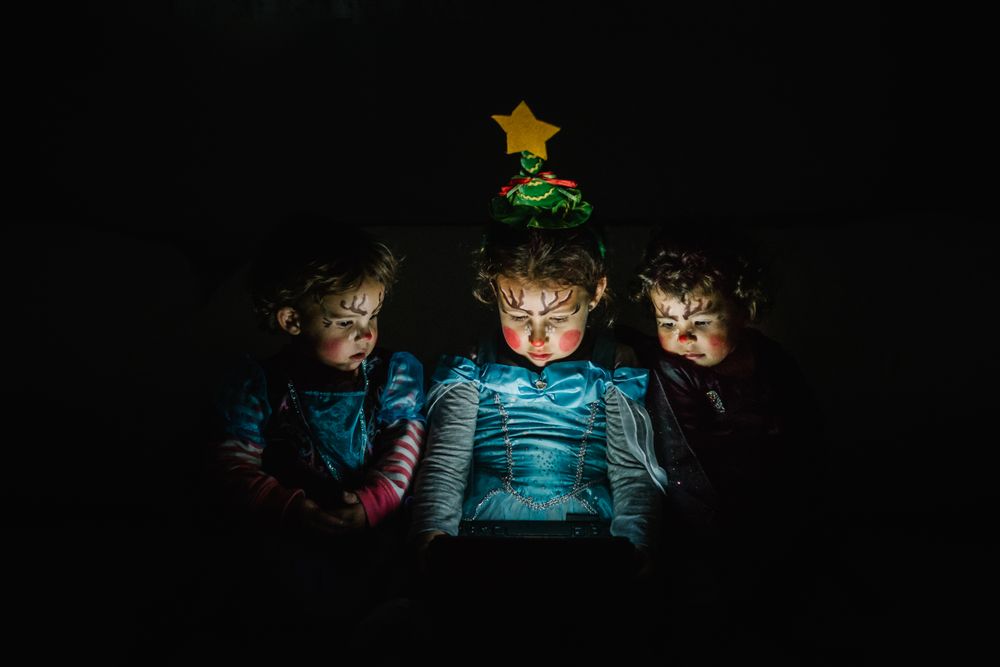 three little princess girls with computer