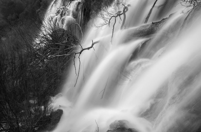 Wonderful waterfall near tree