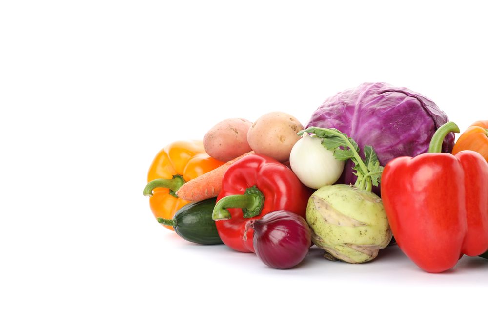Composition with ripe vegetables isolated on plain background