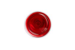 Glass with red wine isolated on blank background, top view