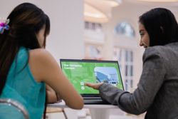 Hotel presentation, Two colleagues explore opportunities on a la