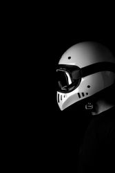 Rider in helmet and glasses at studio