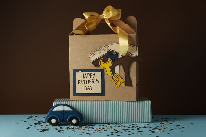 Father's day concept, gifts and greetings, on a brown background.