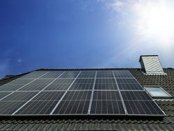 Solar panels producing clean energy on a roof of a residential house