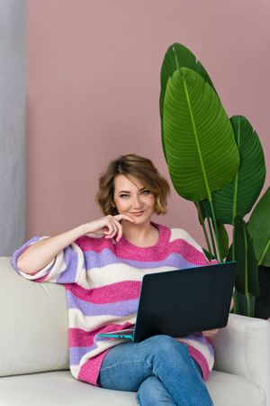 Happy Business Woman Working From Home On Sofa
