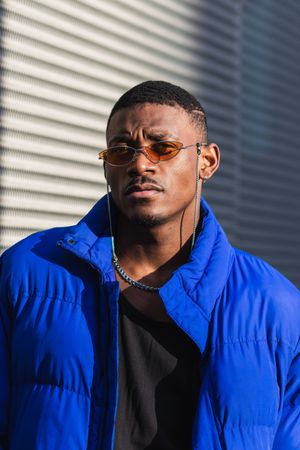 Stylish Black man in sunglasses on street