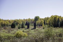 Giant Wader Boots in a field in Cornucopia, Wisconsin