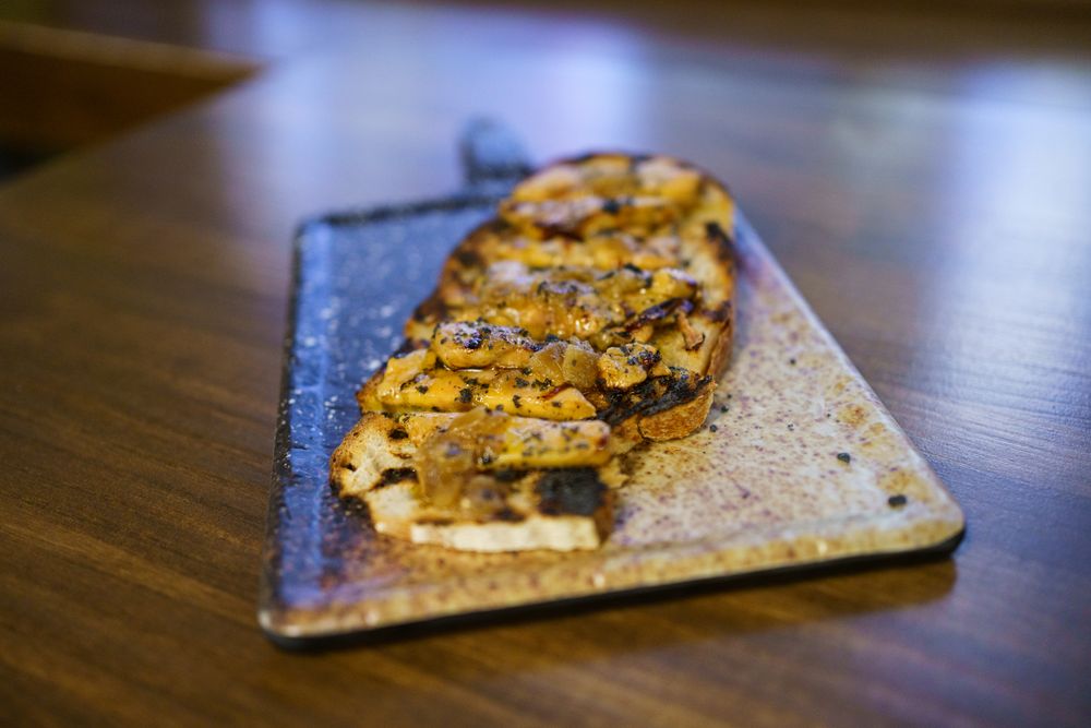 Pate on a piece of toast served in restaurant
