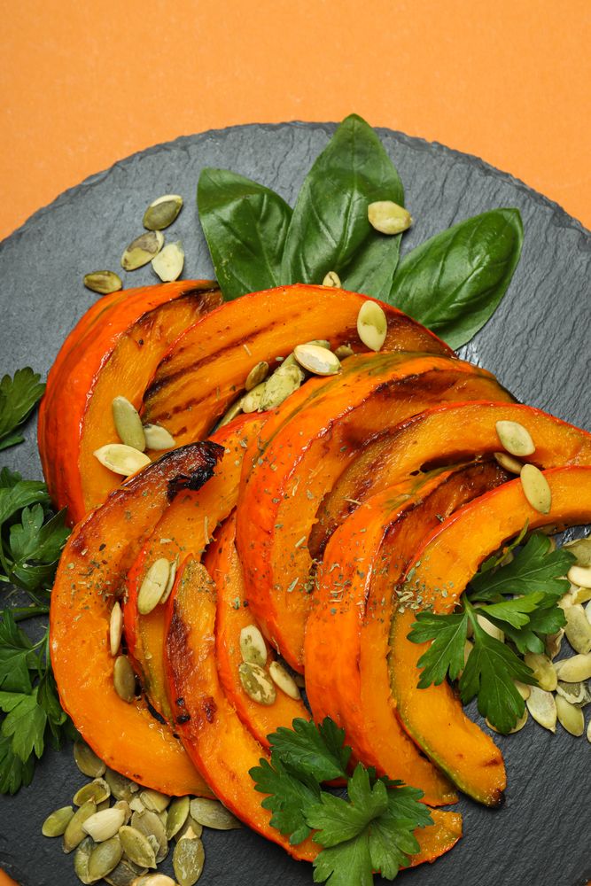Concept of tasty homemade dish - baked pumpkin