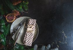 Christmas card concept with table setting with polka dot napkin