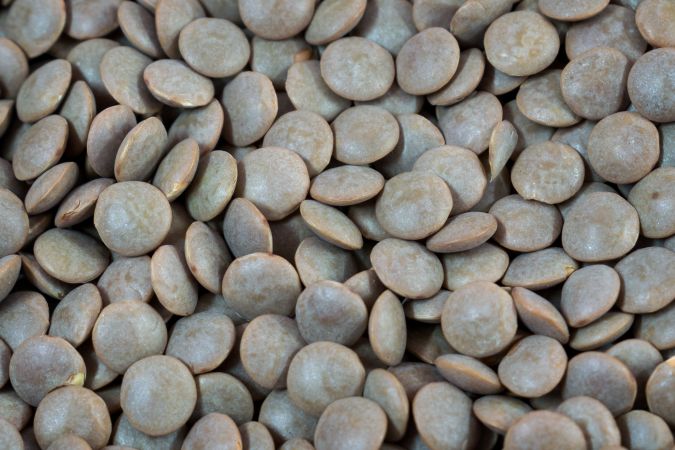 A background full of Indian Lentils also called Masoor Dal