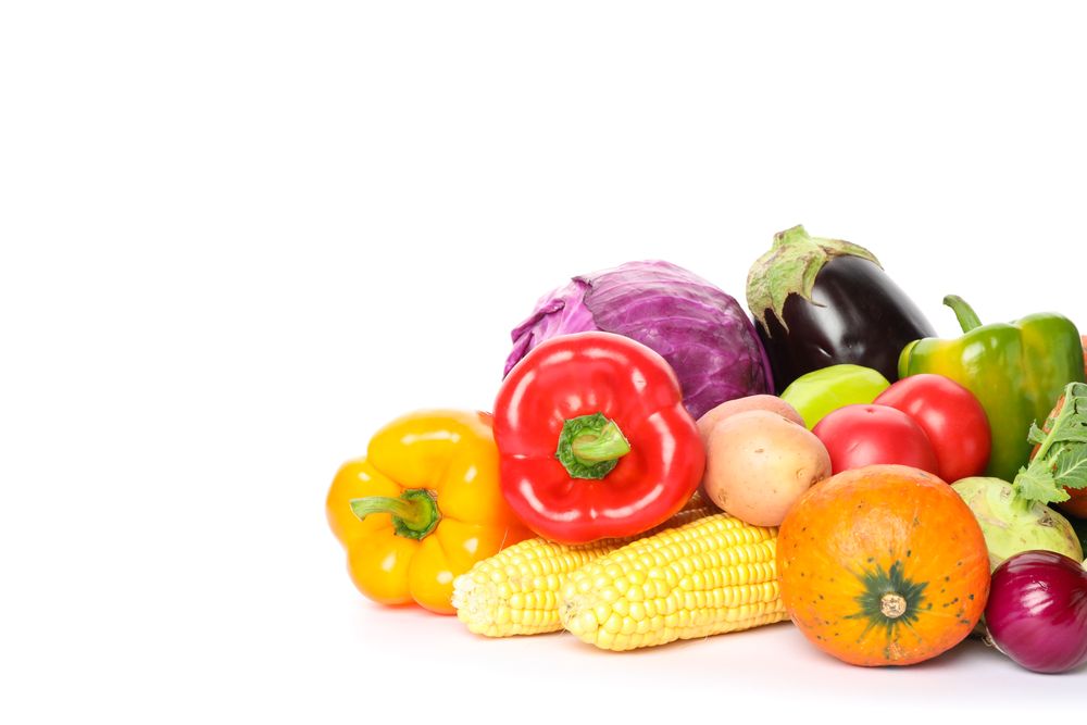 Composition with ripe vegetables isolated on plain background