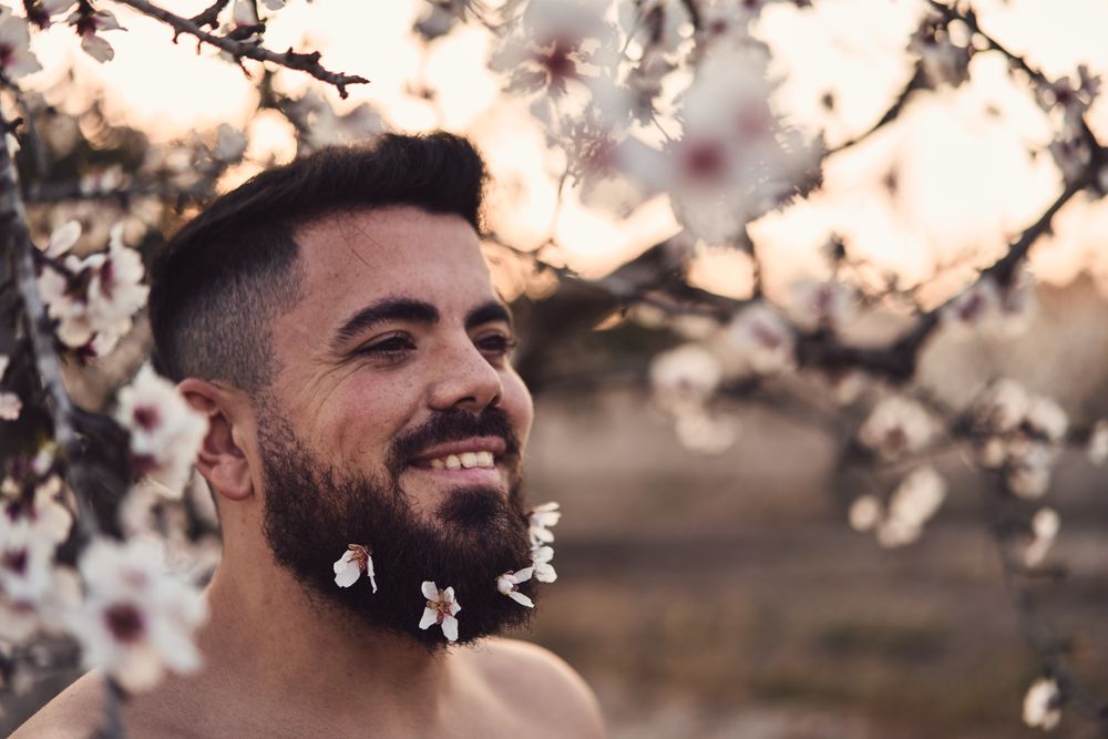 Man with flowers in beard