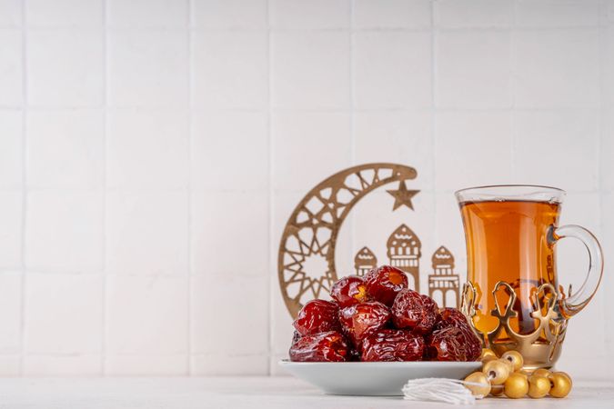 Traditional Ramadan Setting with Dates and Tea in an Elegant Decoration