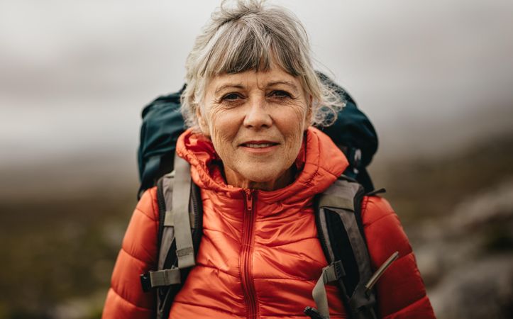 Portrait of mature woman on a hiking trip