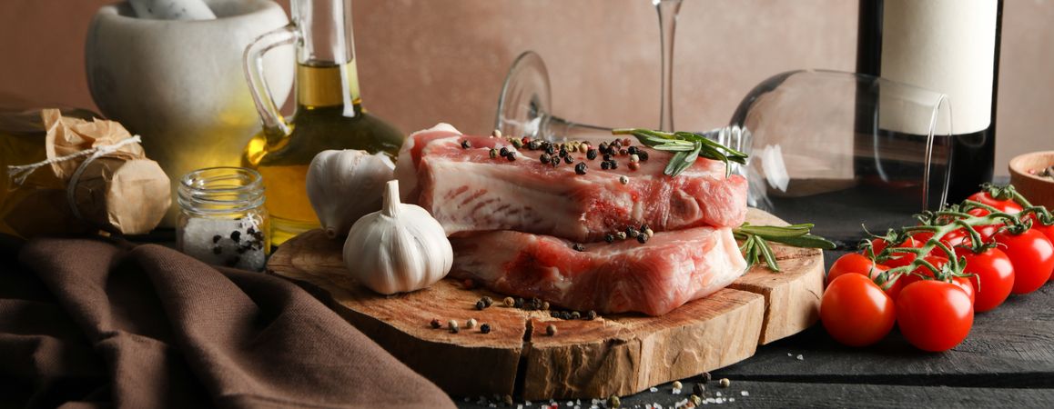 Composition with raw meat and ingredients. Cooking steak concept