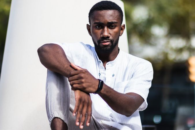 Stylish Black man in city street